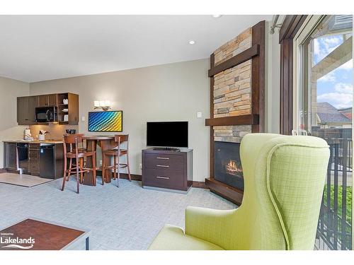 428-190 Jozo Weider Boulevard, The Blue Mountains, ON - Indoor Photo Showing Living Room With Fireplace