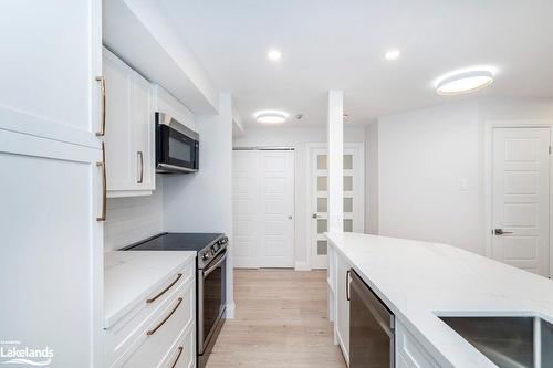 608-75 Ellen Street, Barrie, ON - Indoor Photo Showing Kitchen With Upgraded Kitchen