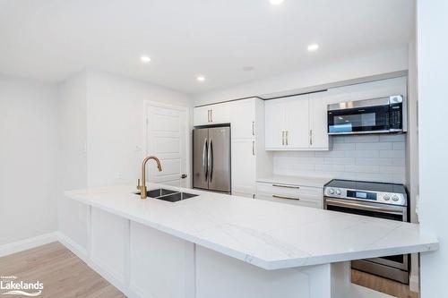 608-75 Ellen Street, Barrie, ON - Indoor Photo Showing Kitchen With Double Sink With Upgraded Kitchen