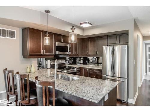 308-4 Brandy Lane Drive, Collingwood, ON - Indoor Photo Showing Kitchen With Stainless Steel Kitchen With Double Sink With Upgraded Kitchen