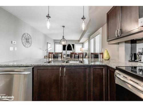 308-4 Brandy Lane Drive, Collingwood, ON - Indoor Photo Showing Kitchen With Double Sink With Upgraded Kitchen