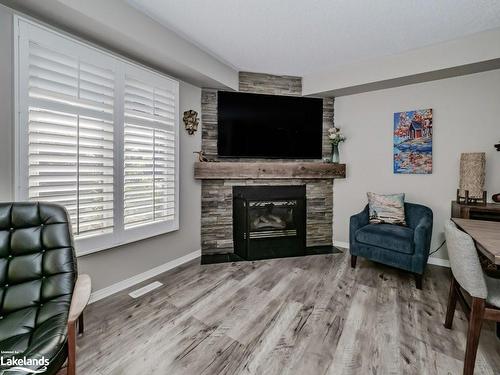 42 Shoreline Drive, Bracebridge, ON - Indoor Photo Showing Living Room With Fireplace