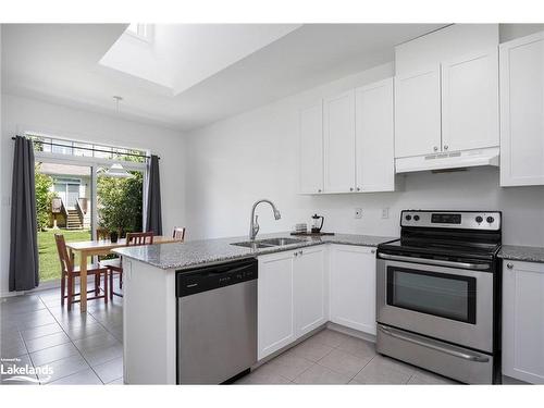 Pw-22 Providence Way, Wasaga Beach, ON - Indoor Photo Showing Kitchen With Stainless Steel Kitchen With Double Sink