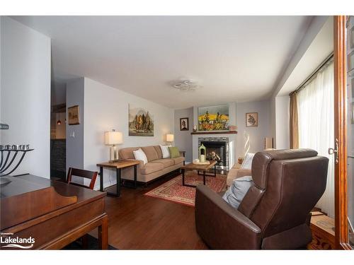 40 Glenwood Drive, Huntsville, ON - Indoor Photo Showing Living Room With Fireplace