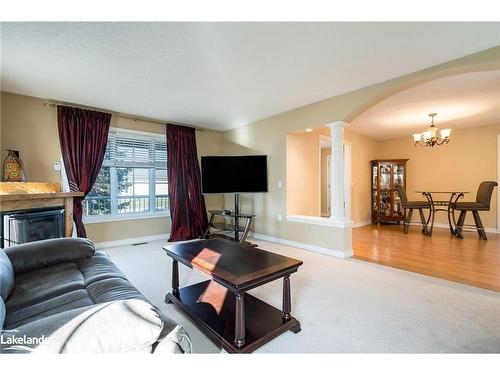 30 Illinois Crescent, Wasaga Beach, ON - Indoor Photo Showing Living Room With Fireplace