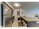 207-2 Brandy Lane Drive, Collingwood, ON  - Indoor Photo Showing Kitchen With Double Sink 