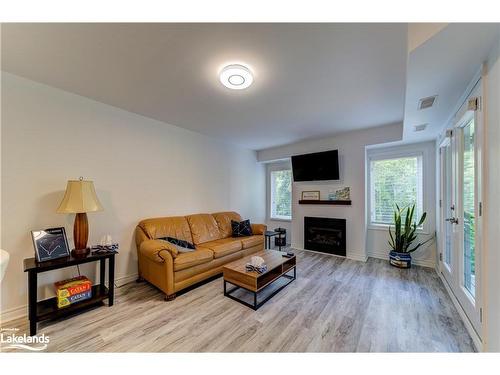 207-2 Brandy Lane Drive, Collingwood, ON - Indoor Photo Showing Living Room With Fireplace