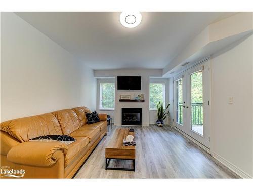 207-2 Brandy Lane Drive, Collingwood, ON - Indoor Photo Showing Living Room With Fireplace