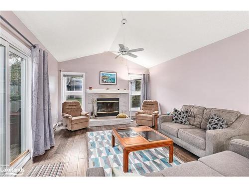 387 Mariners Way, Collingwood, ON - Indoor Photo Showing Living Room With Fireplace