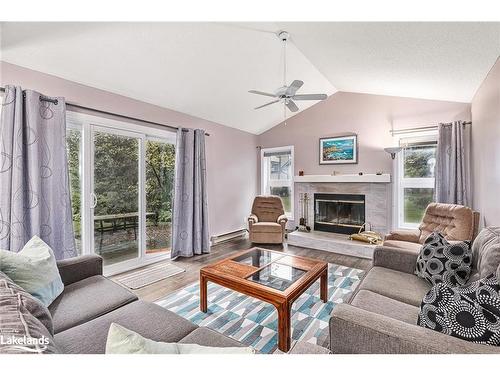 387 Mariners Way, Collingwood, ON - Indoor Photo Showing Living Room With Fireplace