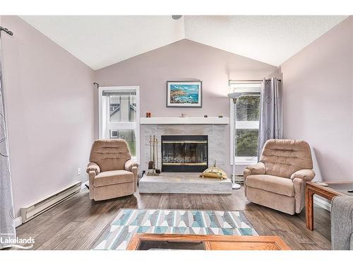 387 Mariners Way, Collingwood, ON - Indoor Photo Showing Living Room With Fireplace