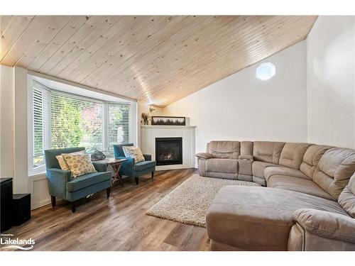 85 Beaumont Drive, Bracebridge, ON - Indoor Photo Showing Living Room With Fireplace