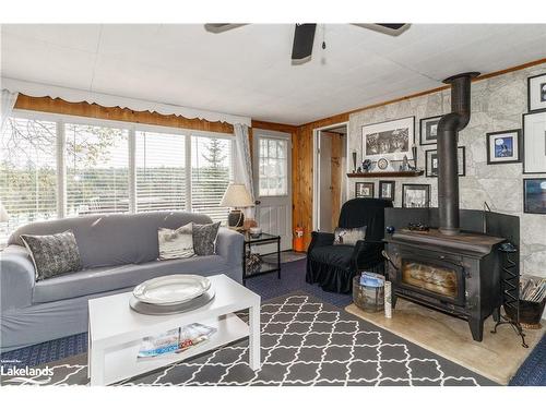 1119 Grist Mill Lane, Dorset, ON - Indoor Photo Showing Living Room With Fireplace