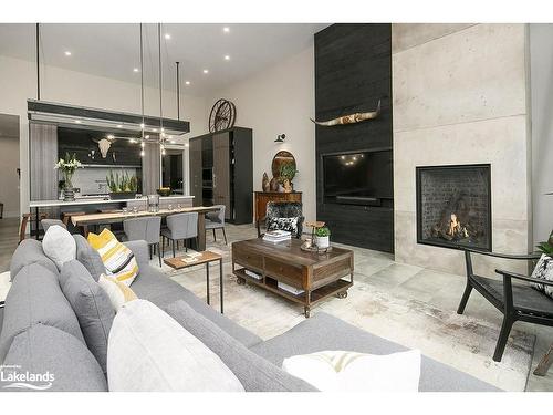 153 Georgian Bay Lane, The Blue Mountains, ON - Indoor Photo Showing Living Room With Fireplace