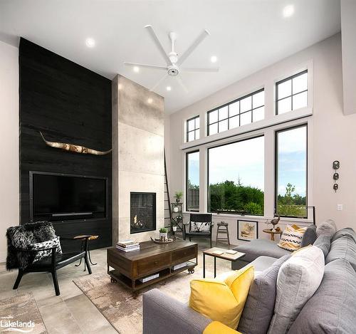 153 Georgian Bay Lane, The Blue Mountains, ON - Indoor Photo Showing Living Room With Fireplace