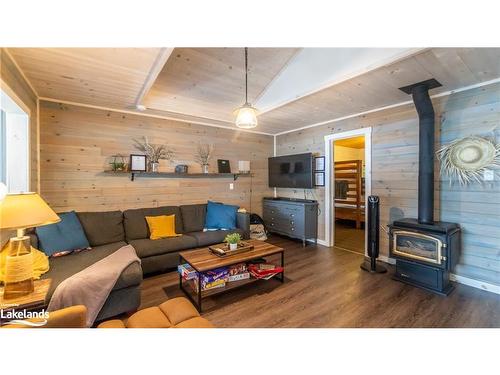 1032 Lakeshore Drive S, Bracebridge, ON - Indoor Photo Showing Living Room With Fireplace