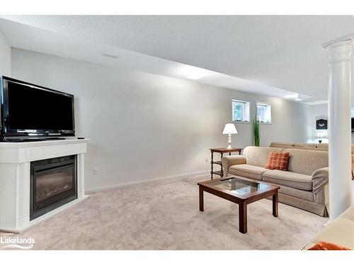 28 Northwood Drive, Wasaga Beach, ON - Indoor Photo Showing Living Room With Fireplace