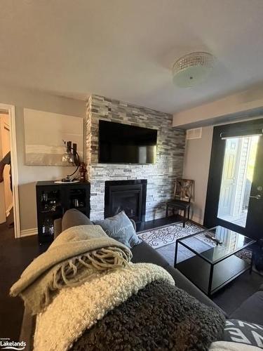 103-6 Anchorage Crescent, Collingwood, ON - Indoor Photo Showing Living Room With Fireplace