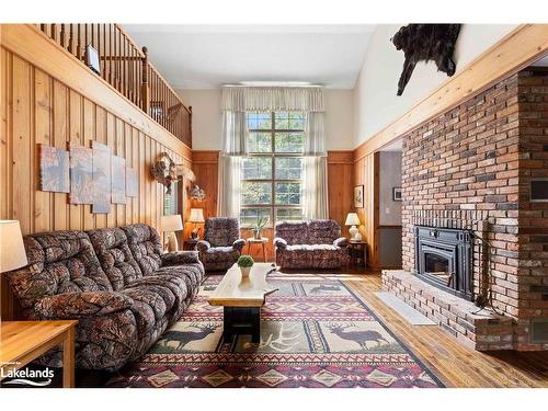 269 Old Muskoka Rd S, South River, ON - Indoor Photo Showing Living Room With Fireplace