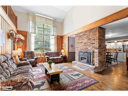 269 Old Muskoka Rd S, South River, ON - Indoor Photo Showing Living Room With Fireplace