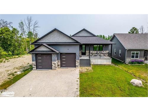 18 Lakeshore Road, Wasaga Beach, ON - Outdoor With Facade