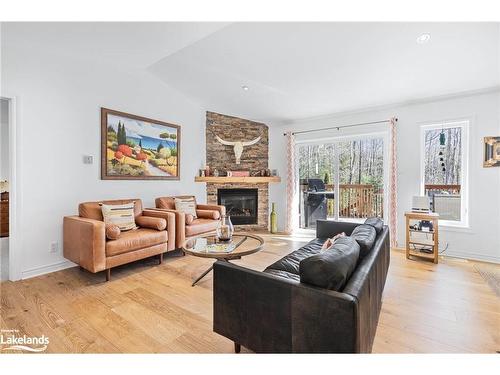 89 Trout Lane, Tiny, ON - Indoor Photo Showing Living Room With Fireplace