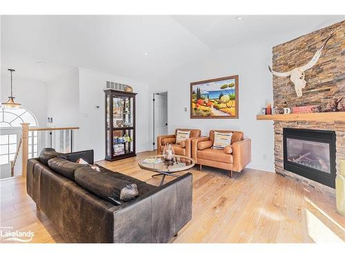 89 Trout Lane, Tiny, ON - Indoor Photo Showing Living Room With Fireplace