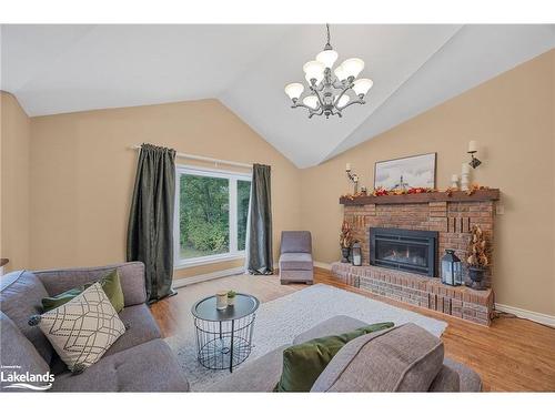 49 Birchwood Trail, Wasaga Beach, ON - Indoor Photo Showing Living Room With Fireplace