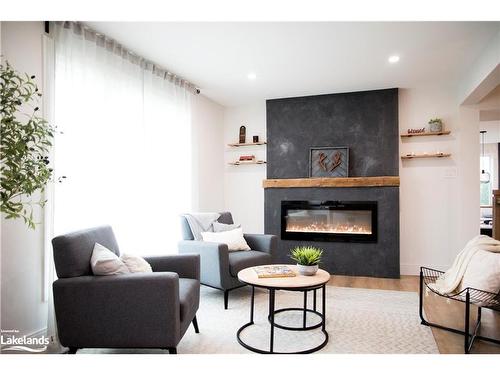 206135 Sykes Street N, Meaford, ON - Indoor Photo Showing Living Room With Fireplace