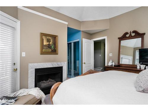 166 Fairway Crescent, Collingwood, ON - Indoor Photo Showing Bedroom With Fireplace