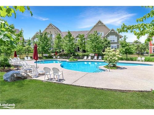 211-115 Fairway Court, The Blue Mountains, ON - Outdoor With In Ground Pool With Backyard