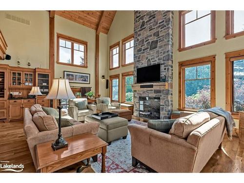 136 Snowbridge Way, The Blue Mountains, ON - Indoor Photo Showing Living Room With Fireplace