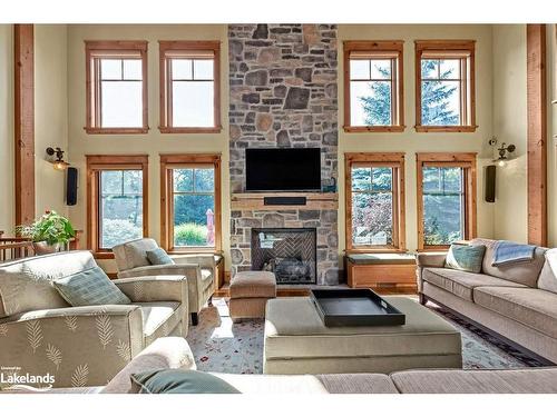 136 Snowbridge Way, The Blue Mountains, ON - Indoor Photo Showing Living Room With Fireplace