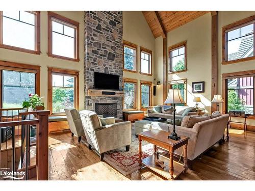 136 Snowbridge Way, The Blue Mountains, ON - Indoor Photo Showing Living Room With Fireplace