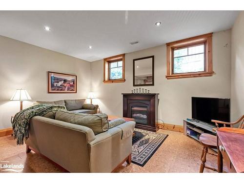 136 Snowbridge Way, The Blue Mountains, ON - Indoor Photo Showing Living Room With Fireplace