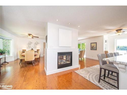 524 Homeland Drive, Emsdale, ON - Indoor Photo Showing Living Room With Fireplace