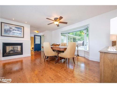 524 Homeland Drive, Emsdale, ON - Indoor Photo Showing Dining Room With Fireplace