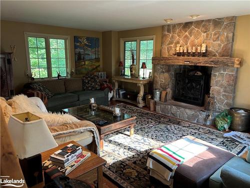 105 Alpine Crescent, Ravenna, ON - Indoor Photo Showing Living Room With Fireplace