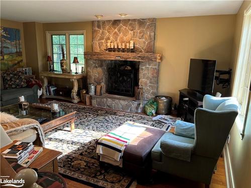 105 Alpine Crescent, Ravenna, ON - Indoor Photo Showing Living Room With Fireplace