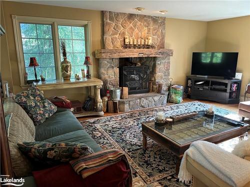 105 Alpine Crescent, Ravenna, ON - Indoor Photo Showing Living Room With Fireplace