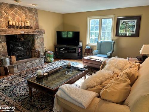 105 Alpine Crescent, Ravenna, ON - Indoor Photo Showing Living Room With Fireplace