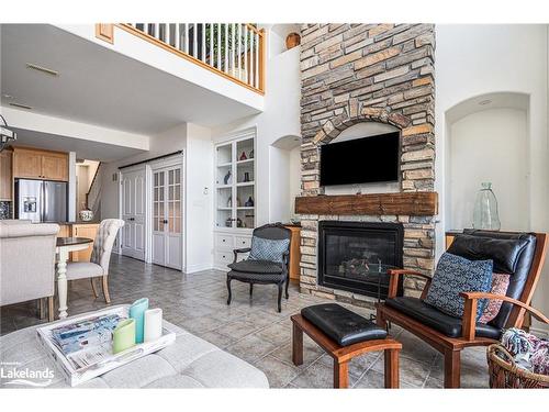 9-209707 Highway 26, The Blue Mountains, ON - Indoor Photo Showing Living Room With Fireplace