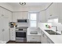 2-15 Golf Course Road, Bracebridge, ON  - Indoor Photo Showing Kitchen With Double Sink 