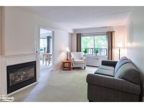 407-54 Fittons Road W, Orillia, ON - Indoor Photo Showing Living Room With Fireplace