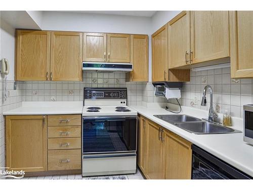 407-54 Fittons Road W, Orillia, ON - Indoor Photo Showing Kitchen With Double Sink