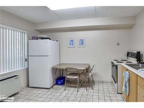 407-54 Fittons Road W, Orillia, ON - Indoor Photo Showing Kitchen With Double Sink