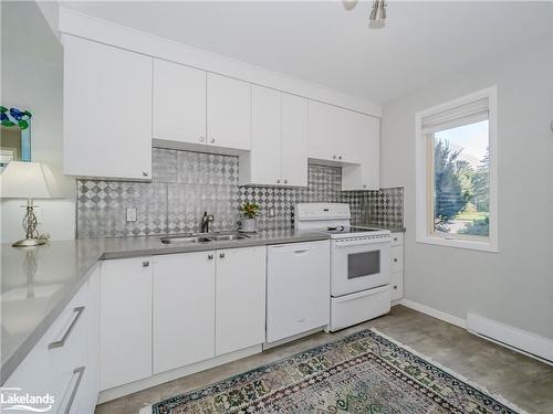 7-15 Golf Course Road, Bracebridge, ON - Indoor Photo Showing Kitchen With Double Sink