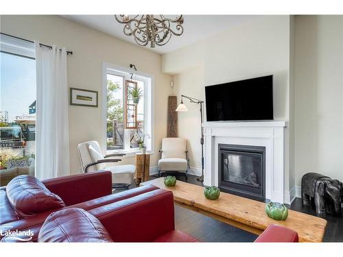 31 Emerson Mews, Collingwood, ON - Indoor Photo Showing Living Room With Fireplace