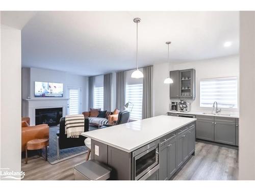 158 Sycamore Street, The Blue Mountains, ON - Indoor Photo Showing Kitchen With Fireplace