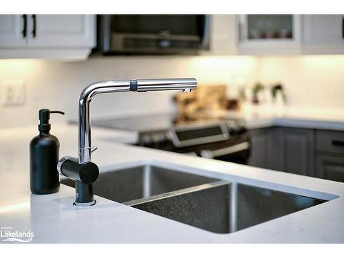 5-209707 26 Highway, The Blue Mountains, ON - Indoor Photo Showing Kitchen With Double Sink